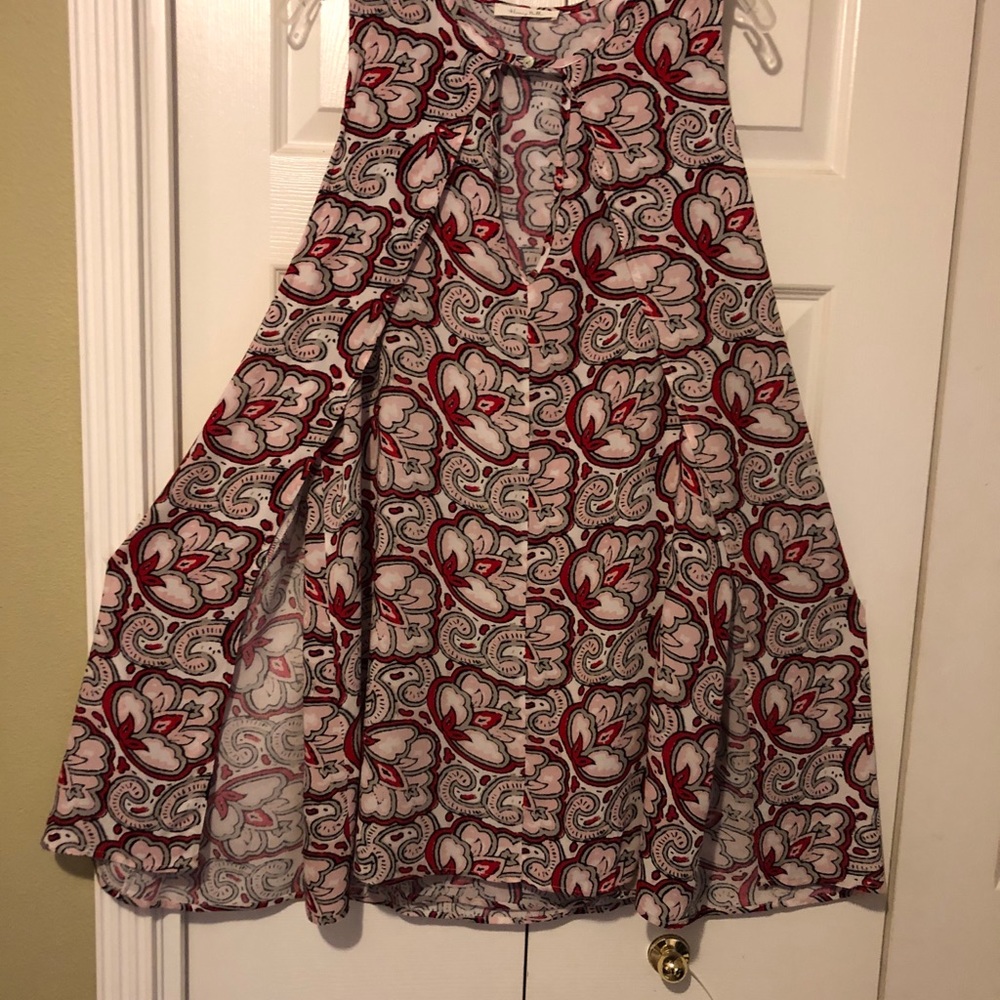 Dress with attached cape and keyhole opening NWOT